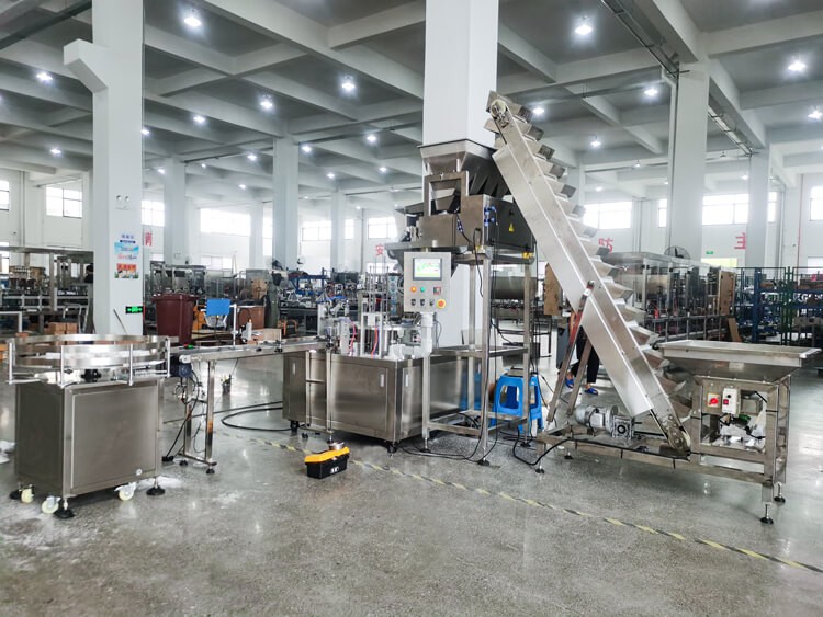 automatic cup filling and sealing  machine for cooking salt-Production and debugging completed(Lifter weighing pan )